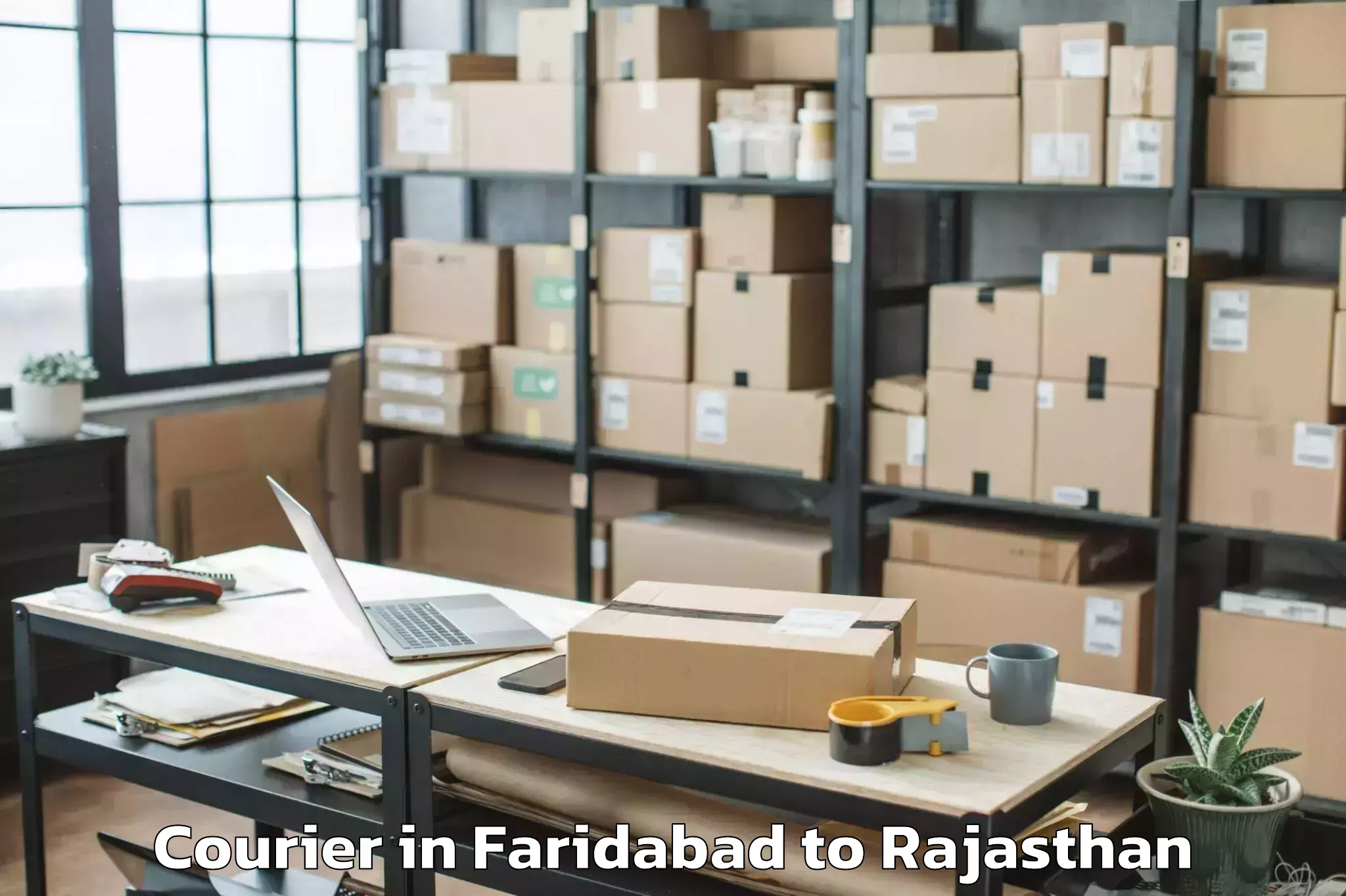 Reliable Faridabad to Ratangarh Churu Courier